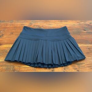 Gold Hinge Navy Pleated Tennis Shirt. Size Medium. Like new.